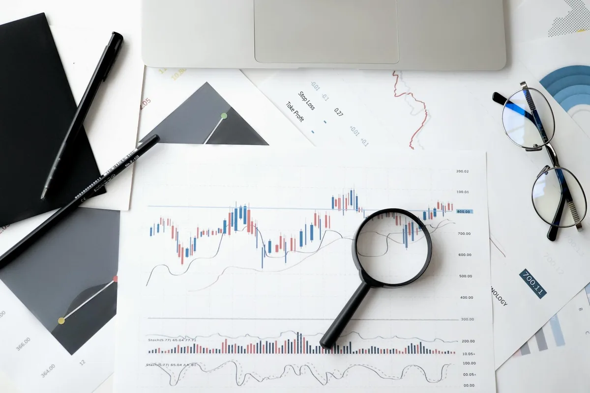 Analyst reviewing charts and data visualisations, illustrating data driven decision making for NDIS providers